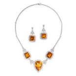 A CITRINE AND DIAMOND NECKLACE AND EARRINGS SUITE in 18ct white gold, the necklace set with a