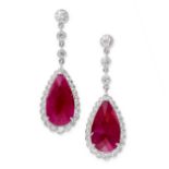 A PAIR OF RUBY AND DIAMOND DROP EARRINGS in 18ct white gold, each set with a pear shaped rose cut