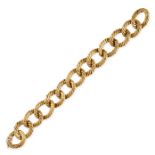 A VINTAGE FANCY LINK BRACELET, KUTCHINSKY 1966 in 18ct yellow gold, formed of a series of curb links