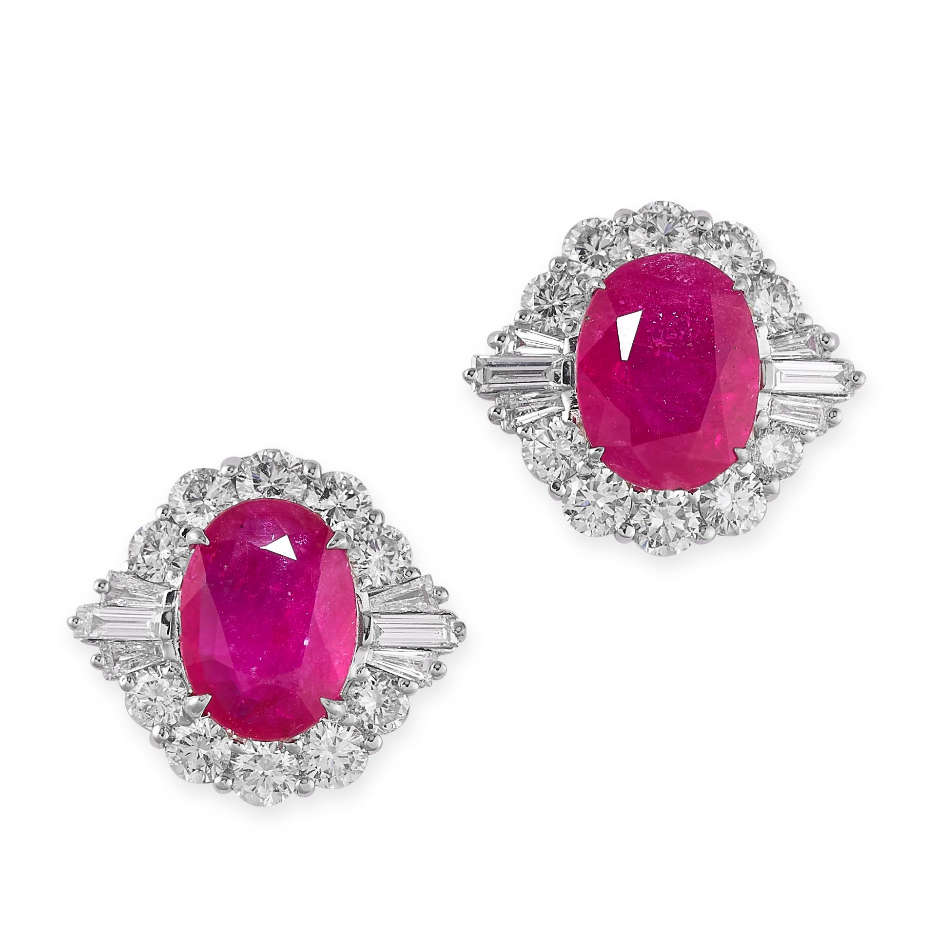 A PAIR OF RUBY AND DIAMOND STUD EARRINGS in 18ct white gold, each set with an oval cut ruby of 1.