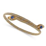 AN ANTIQUE SAPPHIRE SNAKE BRACELET in three colour gold, the body designed as two snakes coiled