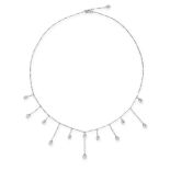 A DIAMOND FRINGE NECKLACE, DIOR in 18ct white gold, the chain suspending twelve pendant drops,