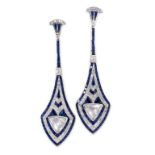 A PAIR OF DIAMOND AND SAPPHIRE EARRINGS in 14ct white gold, of pendent design, each set with a