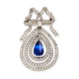 A BURMA NO HEAT SAPPHIRE AND DIAMOND BROOCH set with a polished drop shaped blue sapphire of 3.30