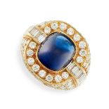 A SAPPHIRE AND DIAMOND RING in 18ct yellow gold, set with a sugarloaf cabochon sapphire of 7.43