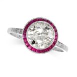 A DIAMOND AND RUBY TARGET RING in Art Deco design, in platinum, set with a central old European