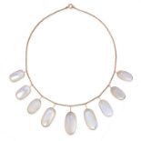 AN ANTIQUE MOONSTONE RIVIERE NECKLACE, EARLY 20TH CENTURY in yellow gold, the chain suspending