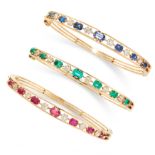 A TRIO OF ANTIQUE DIAMOND, RUBY, SAPPHIRE AND EMERALD BANGLES, 19TH CENTURY in high carat yellow