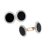 A PAIR OF ART DECO ONYX AND DIAMOND CUFFLINKS, CARTIER in yellow gold and platinum, each with two