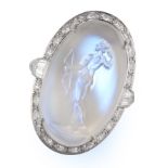 AN EXCEPTIONAL MOONSTONE INTAGLIO AND DIAMOND RING in platinum, set with a large oval carved