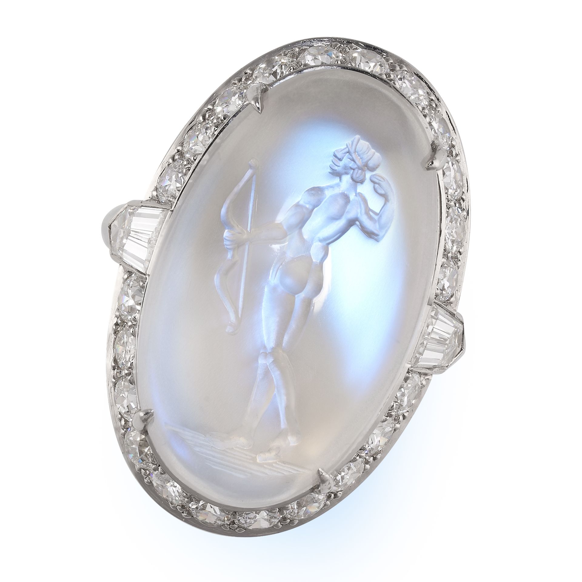 AN EXCEPTIONAL MOONSTONE INTAGLIO AND DIAMOND RING in platinum, set with a large oval carved