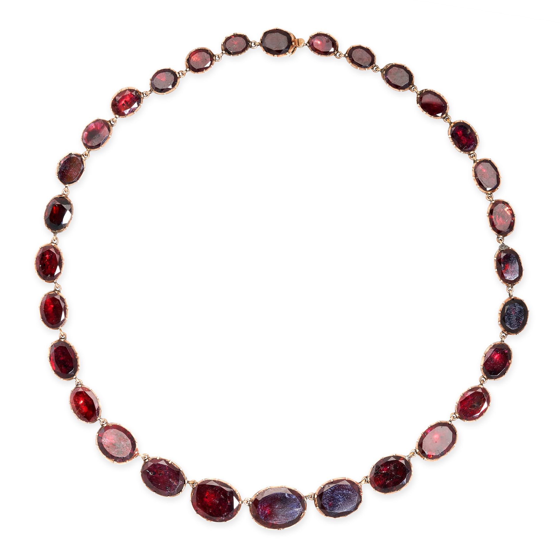 AN ANTIQUE GARNET RIVIERE NECKLACE, 19TH CENTURY in yellow gold, comprising a single row of thirty