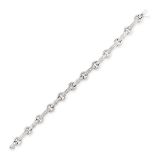 A DIAMOND BRACELET, GARRARD in 18ct white gold, formed of a series of bevelled baton links set