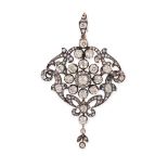 A FINE ANTIQUE DIAMOND PENDANT / BROOCH, 19TH CENTURY in yellow gold and silver, the body set