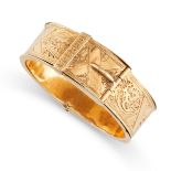 AN ANTIQUE BELT BUCKLE RING, 19TH CENTURY in yellow gold, with engraved foliate decoration, no assay