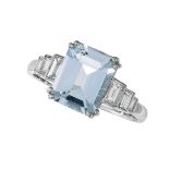 AN AQUAMARINE AND DIAMOND RING set with a step cut aquamarine weighing 2.37 carats, accented at each