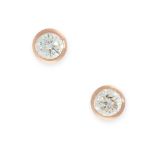 A PAIR OF SOLITAIRE DIAMOND STUD EARRINGS in 18ct rose gold, each bezel set with a round cut