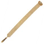 A DIAMOND FANCY LINK BRACELET in 9ct yellow gold, of strap design, formed of alternating bevelled