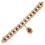 AN ANTIQUE FRENCH GARNET MOURNING LOCKET BRACELET, 19TH CENTURY in 18ct yellow gold, comprising a