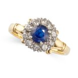 A SAPPHIRE AND DIAMOND RING in 18ct yellow gold, of cluster design, claw set with a round cut