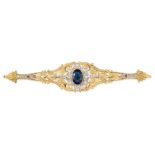 A DIAMOND AND PASTE BROOCH, EARLY 20TH CENTURY, the centre set with an oval blue paste stone, to a