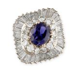 AN IOLITE AND DIAMOND RING set with an oval iolite, to a ballerina style surround of round cut and