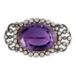 AN ANTIQUE AMETHYST AND DIAMOND BROOCH, 19TH CENTURY in yellow gold and silver, set with an oval cut