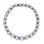 A MOONSTONE NECKLACE, EARLY 20TH CENTURY in silver, comprising a row of graduated oval cabochon