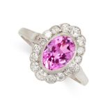AN UNHEATED PINK SAPPHIRE AND DIAMOND RING in cluster design, set with an oval cut pink sapphire