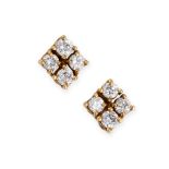 A PAIR OF DIAMOND CLUSTER STUD EARRINGS each set with four round cut diamonds, the butterfly backs