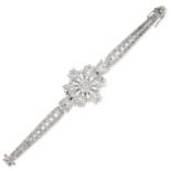 A MID CENTURY DIAMOND BRACELET, 1950s centring on a floral motif set with round cut diamonds, to