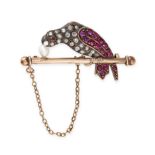 AN ANTIQUE RUBY, DIAMOND AND PEARL PARROT BROOCH in yellow gold and silver, designed as a parrot