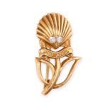 CARTIER, A DIAMOND 30 YEARS ANNIVERSARY BROOCH designed as a shell with a stem and leaves,