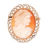 A CAMEO BROOCH set with a carved shell cameo depicting the bust of a lady within a wirework