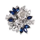 A SAPPHIRE AND DIAMOND DRESS RING set with two principal round cut diamonds accented by marquise cut