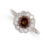 A FANCY COLOURED DIAMOND AND WHITE DIAMOND CLUSTER RING set with a round cut brown diamond of 1.01