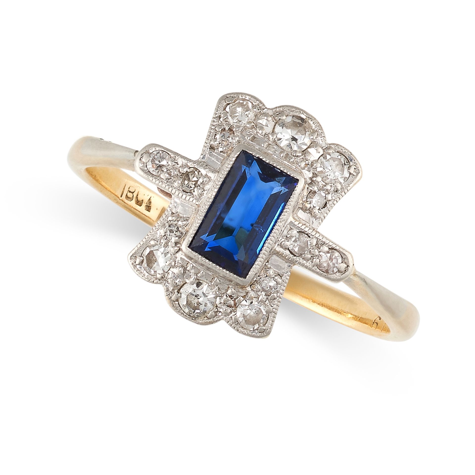 NO RESERVE - A SAPPHIRE AND DIAMOND DRESS RING in 18ct yellow gold and platinum, set with a baguette