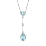 NO RESERVE - AN AQUAMARINE AND DIAMOND PENDANT NECKLACE in yellow gold and platinum, set with two
