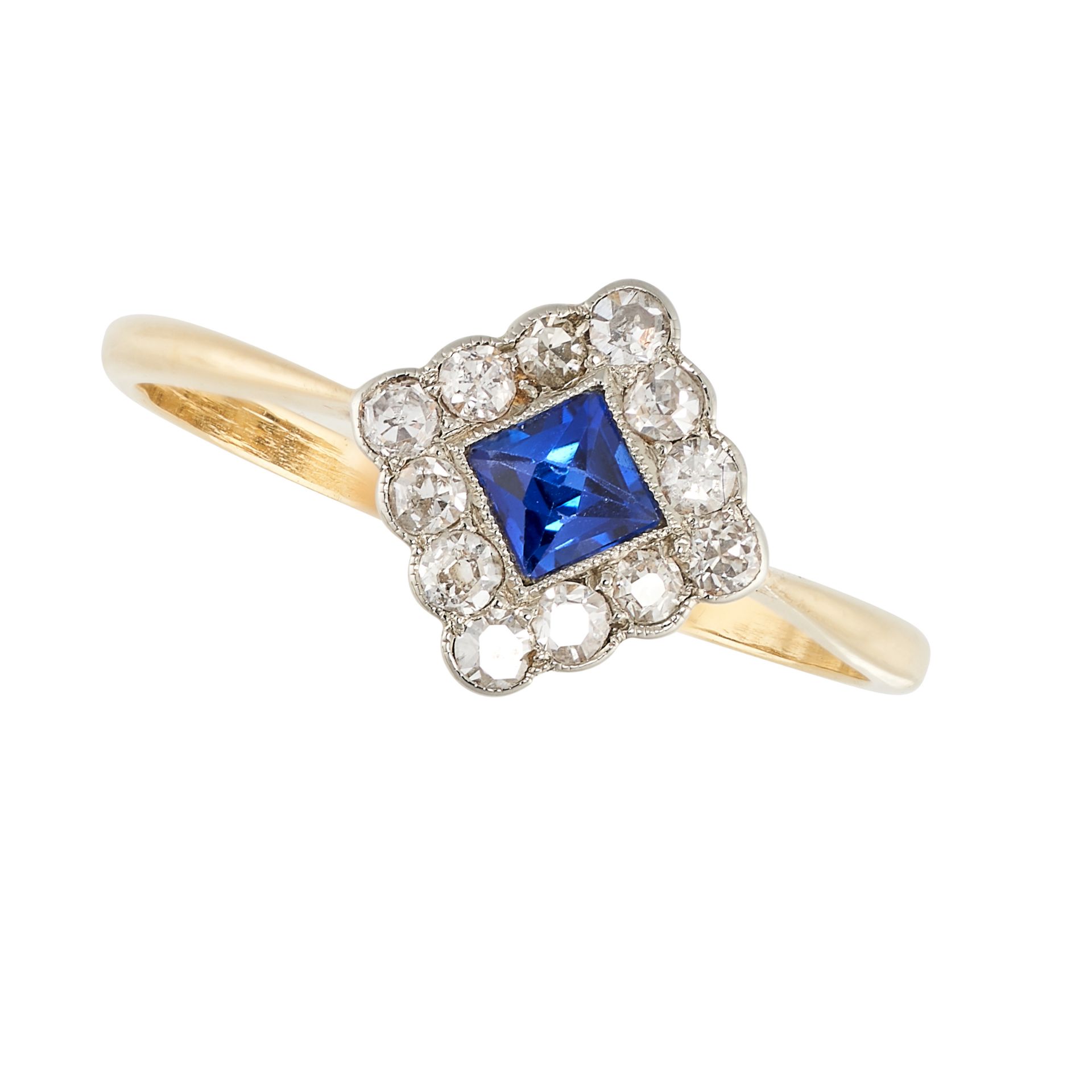 NO RESERVE - AN ART DECO SAPPHIRE AND DIAMOND RING in 18ct yellow gold and platinum, the face set