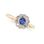 NO RESERVE - A SAPPHIRE AND DIAMOND RING in 18ct yellow gold and platinum, set with a round cut blue