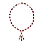 NO RESERVE - AN ANTIQUE GARNET RIVIERE NECKLACE AND PENDANT, EARLY 19TH CENTURY in yellow gold,