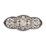 AN ANTIQUE DIAMOND BROOCH in yellow gold and silver, the oval body set with a principal old cut