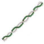 AN EMERALD AND DIAMOND BRACELET in 18ct yellow gold and white gold, of intertwined design, set