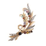 A VINTAGE SAPPHIRE BROOCH in yellow gold, designed as a bouquet of flowers, set with round cut