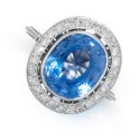 A CEYLON NO HEAT SAPPHIRE AND DIAMOND RING set with a cushion cut blue sapphire of 6.12 carats,