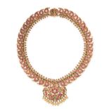 A SOUTH INDIAN MANGO MALA RUBY, EMERALD AND DIAMOND NECKLACE in high carat yellow gold, formed of