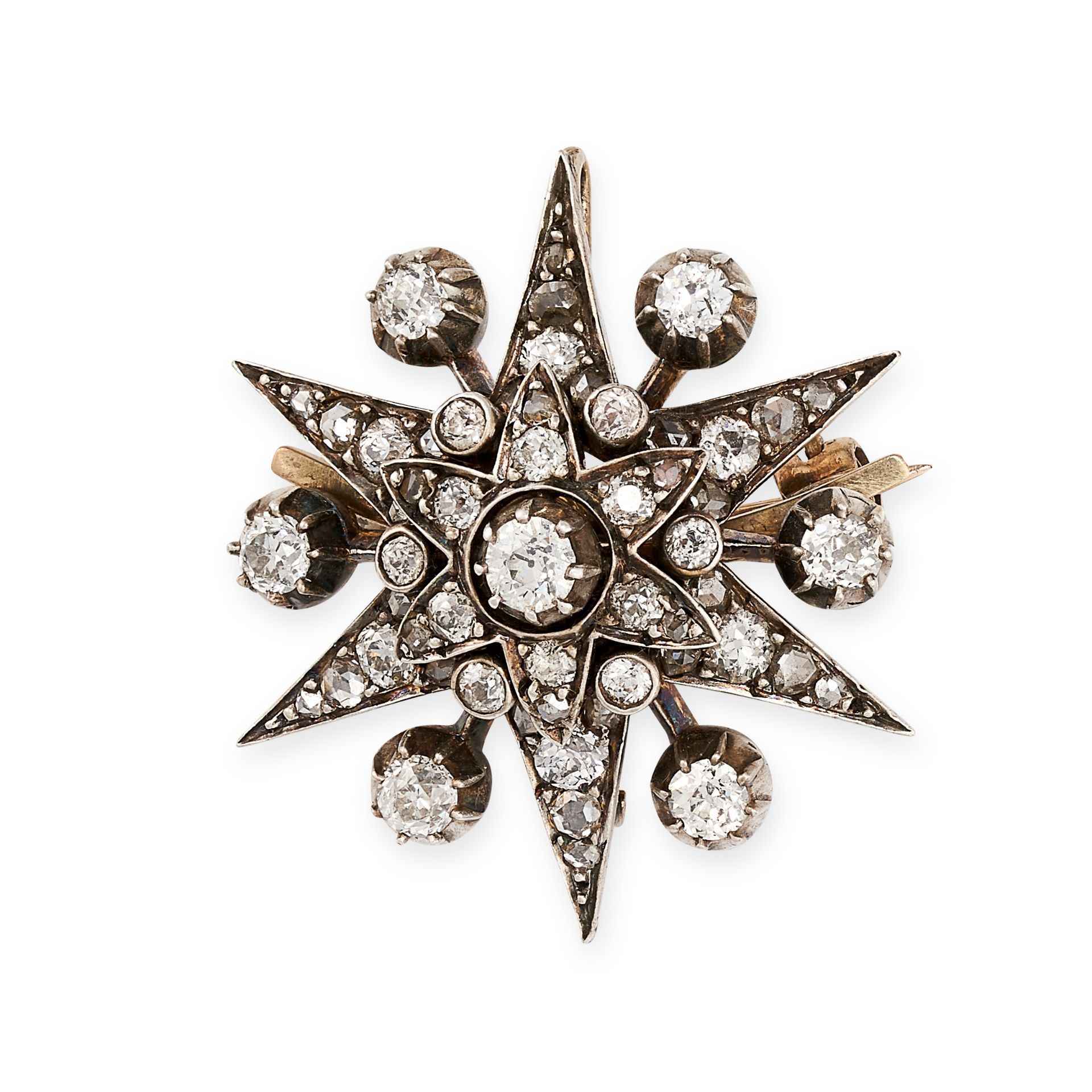 AN ANTIQUE DIAMOND STAR BROOCH / PENDANT, 19TH CENTURY in yellow gold and silver, set with old cut