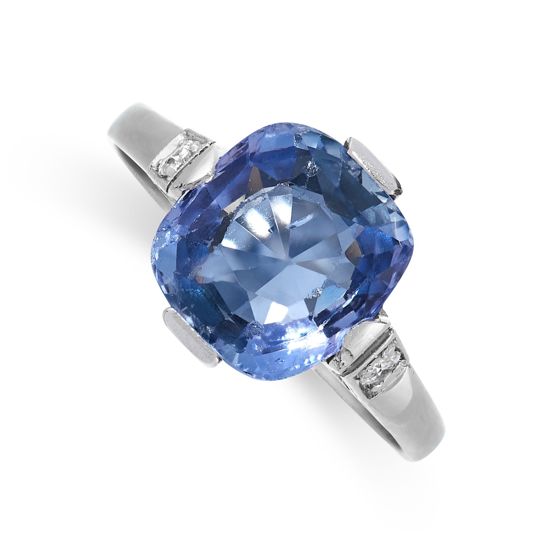 A CEYLON NO HEAT COLOUR CHANGE SAPPHIRE AND DIAMOND RING set with a cushion cut sapphire of 3.74