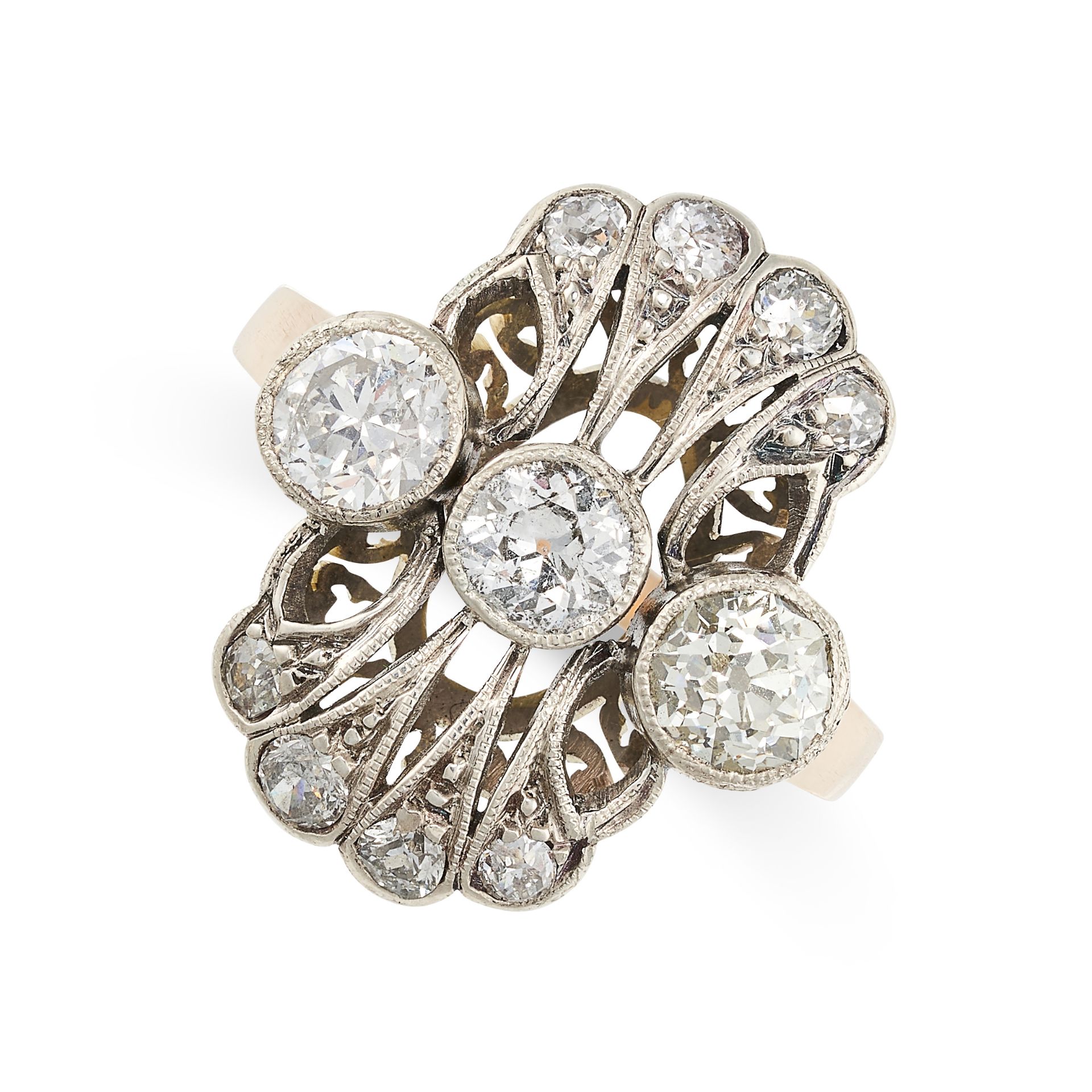 A DIAMOND DRESS RING, CIRCA 1940 in yellow gold and silver, set with old cut diamonds, the