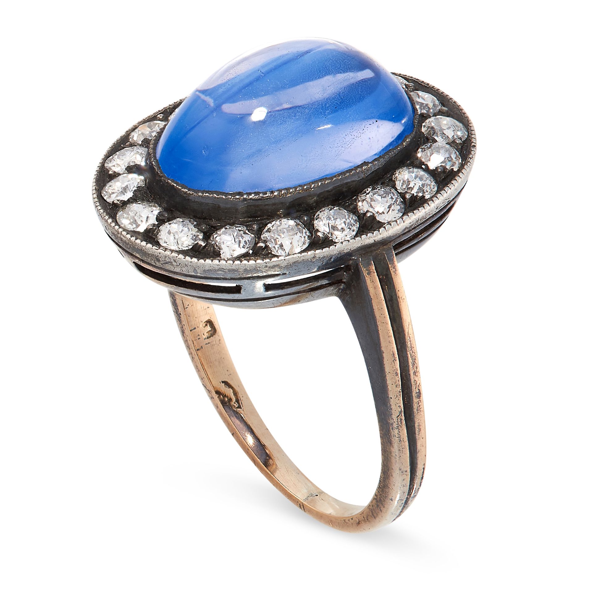 A CEYLON NO HEAT SAPPHIRE AND DIAMOND RING in yellow gold and silver, set with an oval cabochon blue - Image 2 of 2